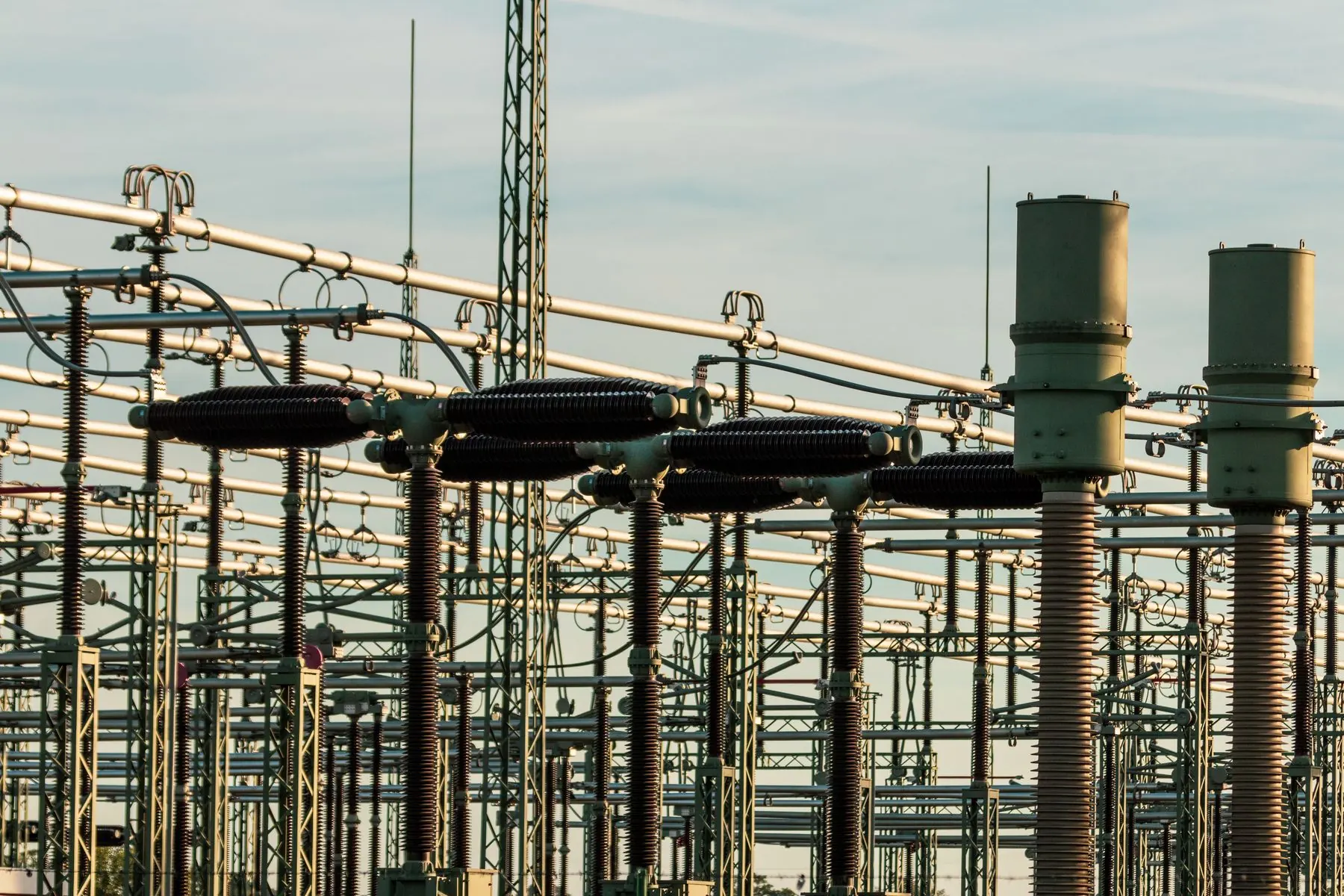 High-voltage substation equipment against an open sky