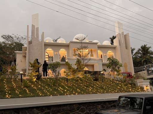 Masjid Fathima mosque exterior lit at dusk, Perinthalmanna